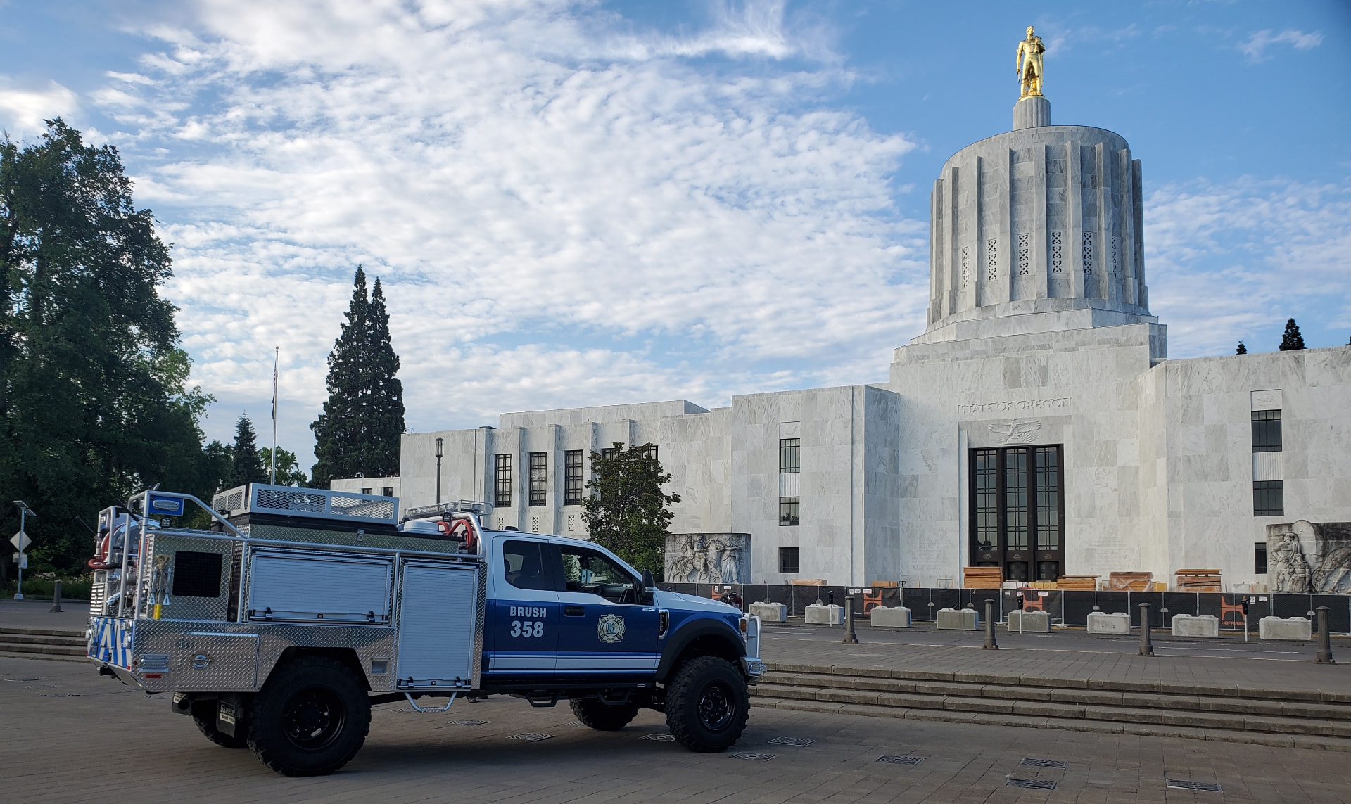 Keizer Fire District brush truck 358 parked in front of the Oregon State Capitol.